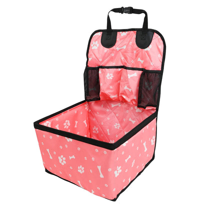 Pink pet car seat cover with bone and paw pattern on a white background