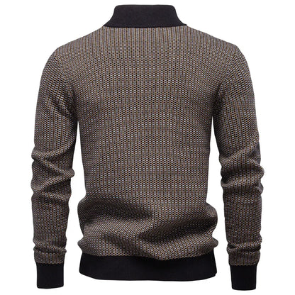 Brown patterned sweater with black ribbed trim on a white background