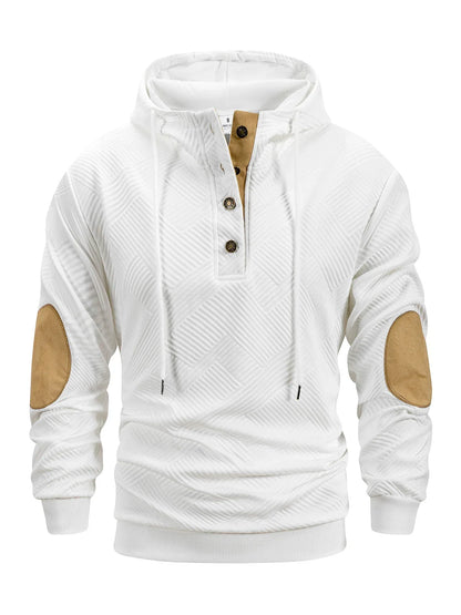 White hoodie with brown elbow patches on a white background
