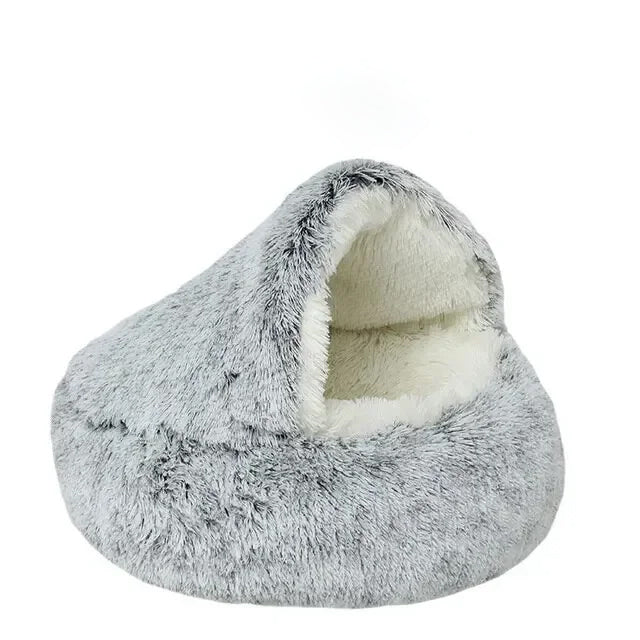 Fluffy gray pet bed with white interior on a white background