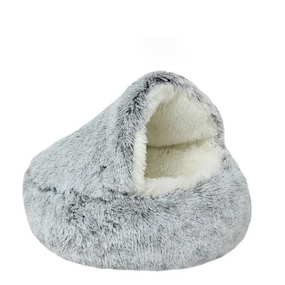 Fluffy gray pet bed with white interior on a white background
