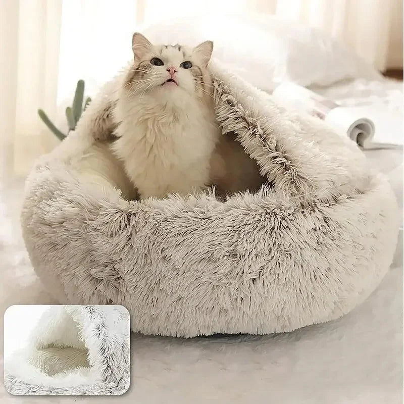 Fluffy pet bed with a cat inside, set against a soft, blurred background.