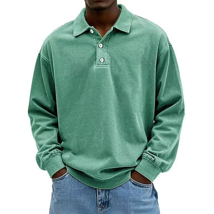 Green long-sleeve polo shirt worn by a person on a white background