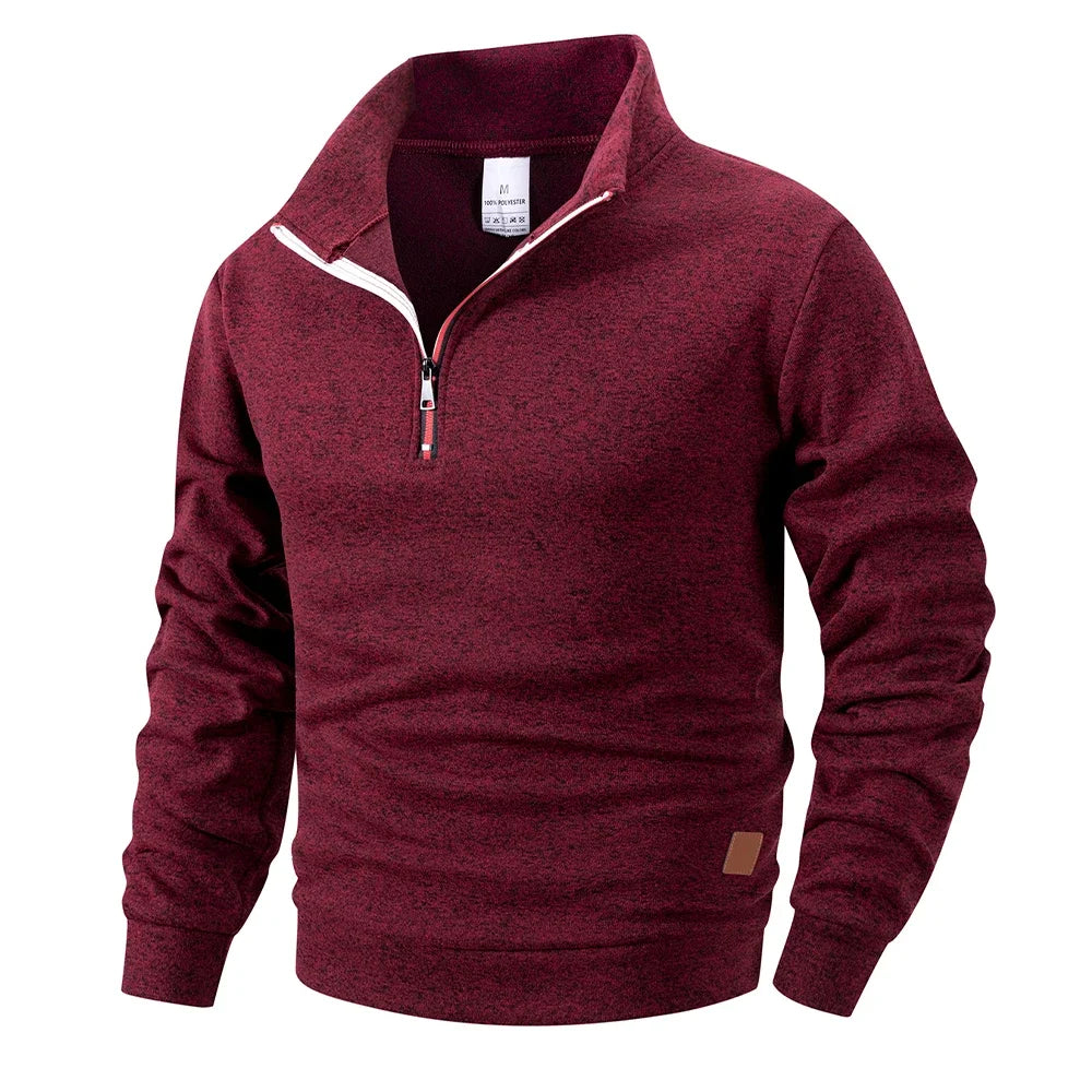 Maroon pullover with a quarter zip on a white background