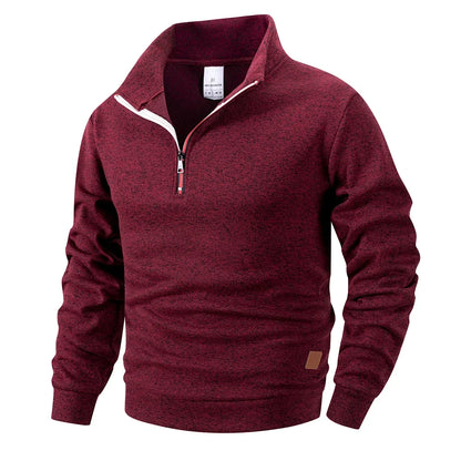 Maroon pullover with a quarter zip on a white background