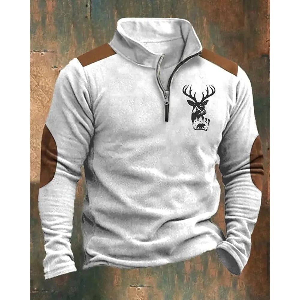 White long-sleeve shirt with brown accents and a deer graphic on a textured background