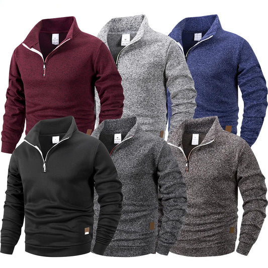 Collection of five different colored quarter-zip sweaters on a white background