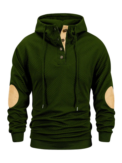 Green hoodie with beige elbow patches on a white background