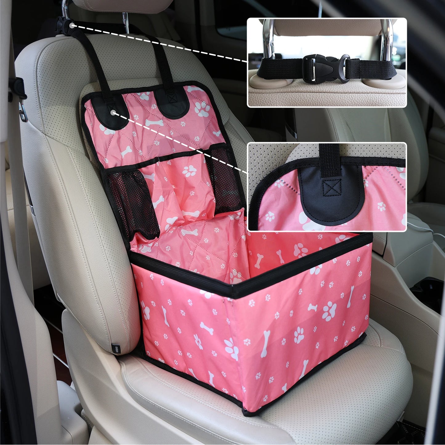 Pink pet car seat cover with paw print design on a car seat, showing details of straps and backrest.