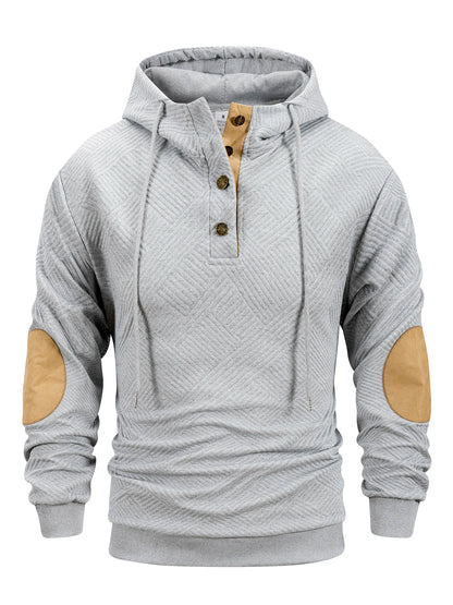 Gray hoodie with beige elbow patches on a white background