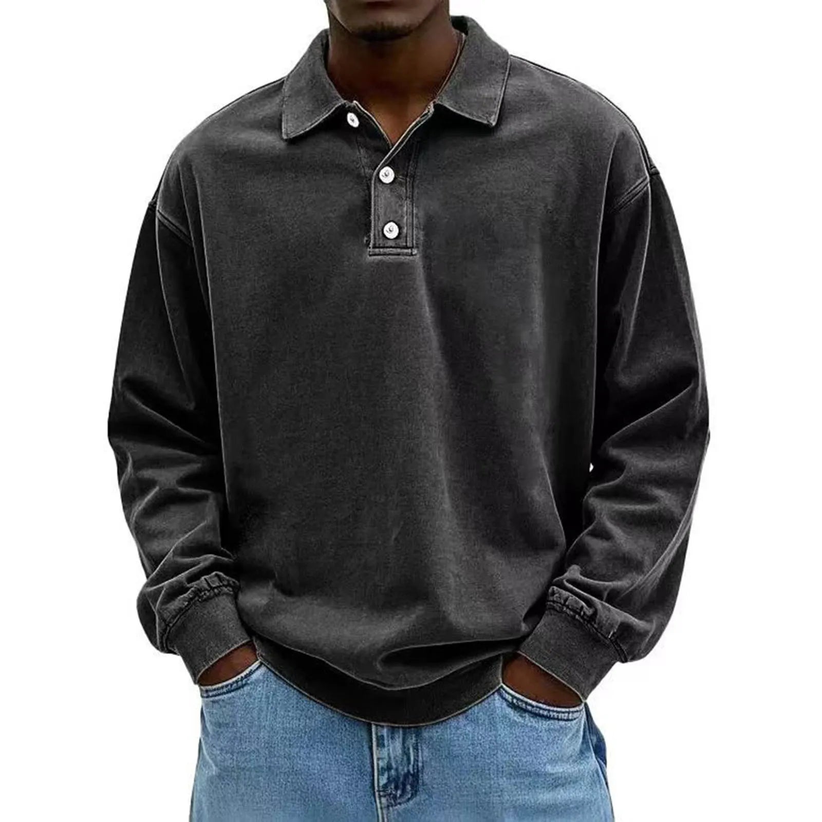 Person wearing a dark gray long-sleeve polo shirt with rolled-up sleeves on a white background