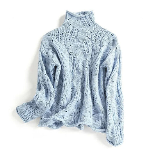 Light blue knitted sweater on a white background